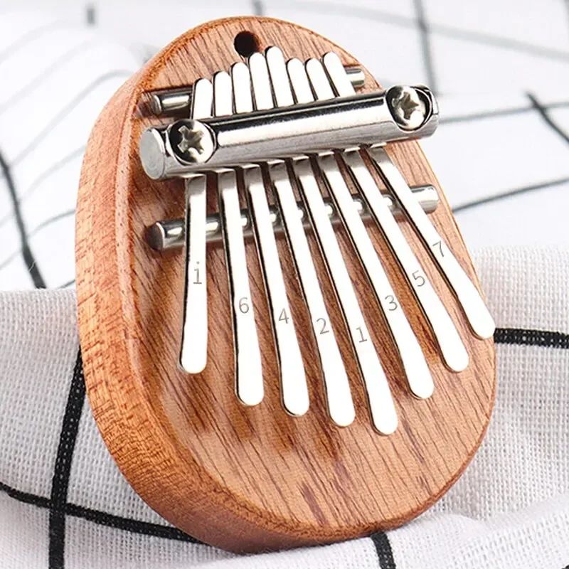بيانو إصبع خشبي صغير بـ 8 نغما - مراجعة Musical Instrument For Beginners وسعره